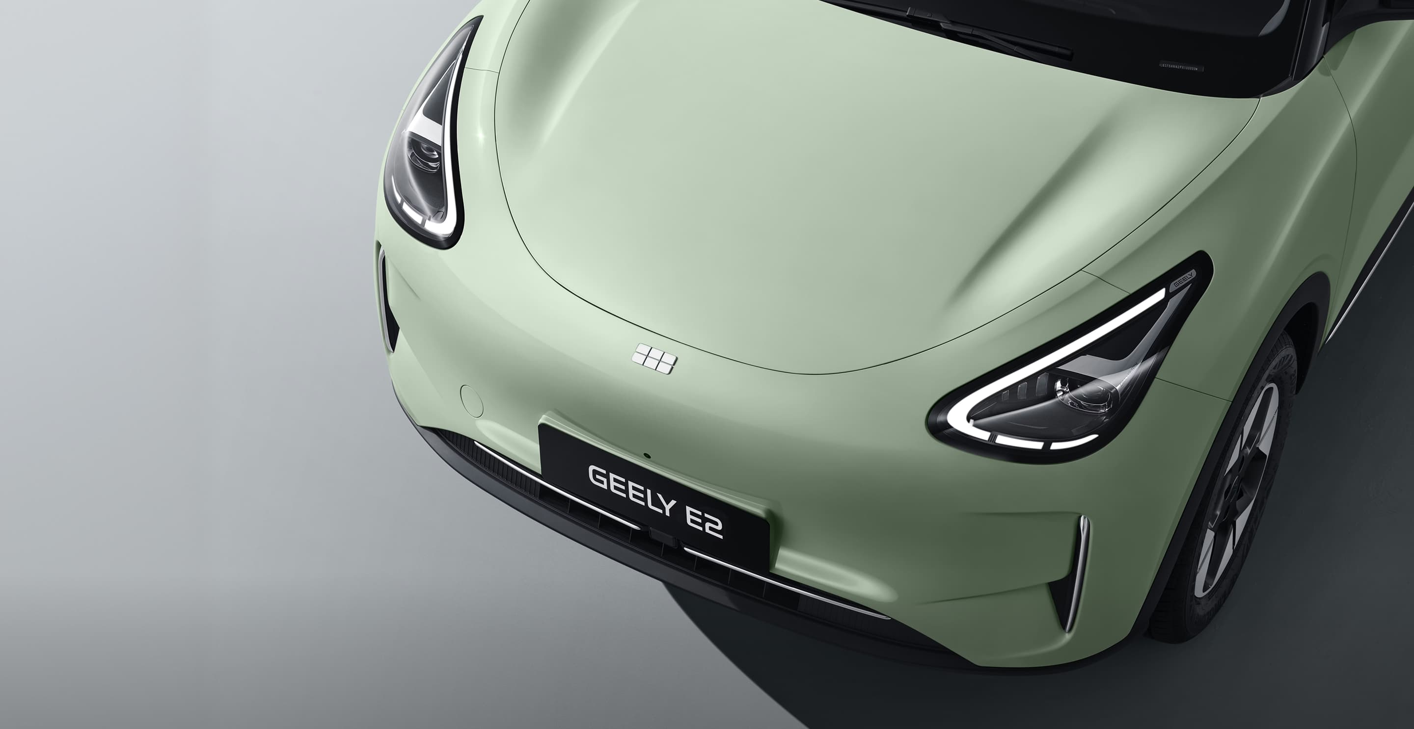 Geely E2 automatic LED headlights with signature daytime running lights